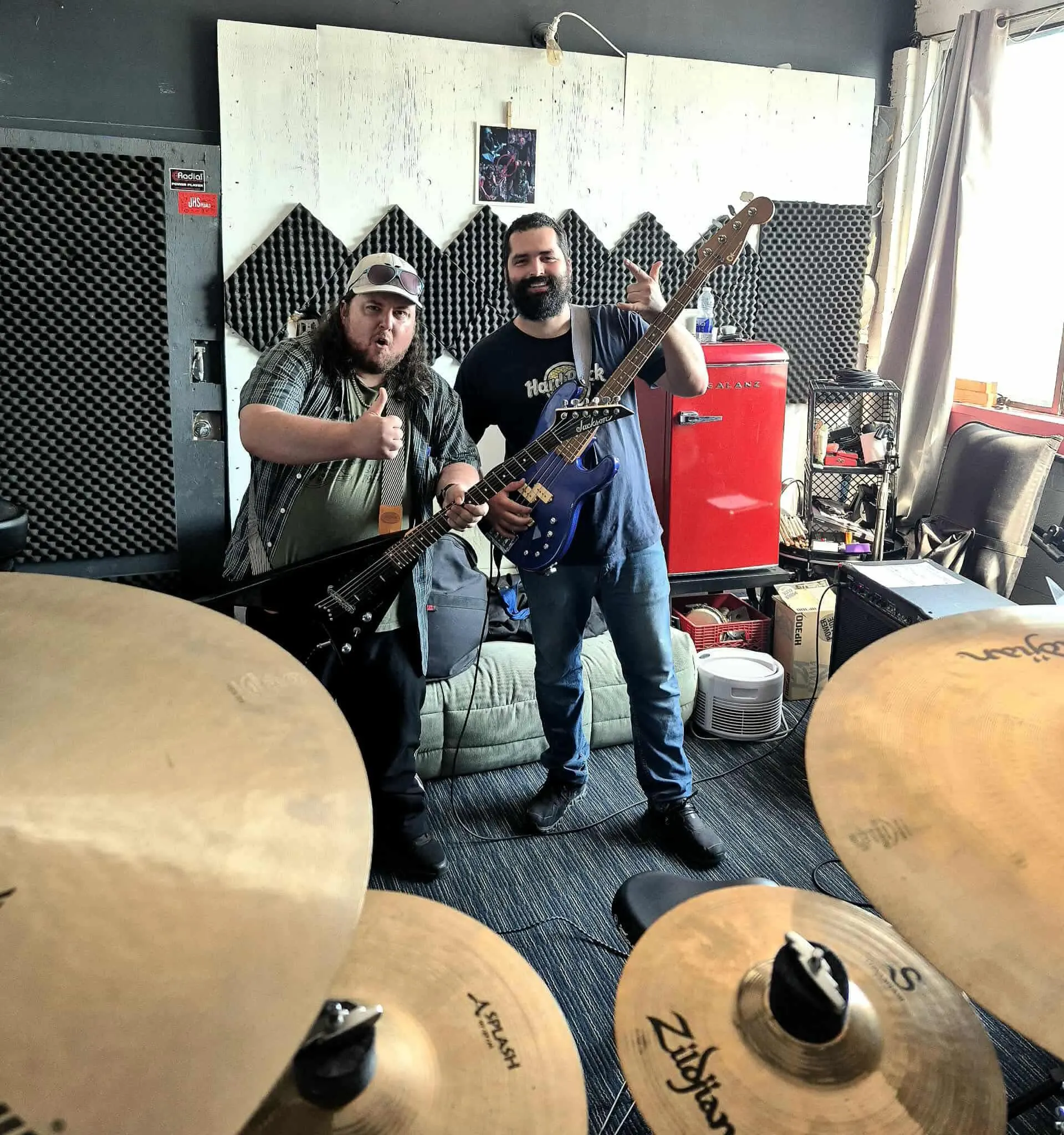 Musician playing guitar inside a Marsonic room